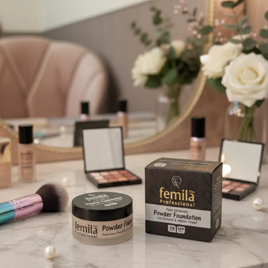 Femila Professional powder foundation and makeup products on vanity with roses and mirror